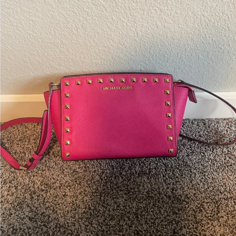 Michael Kors medium pink silver studded Selma bag.
